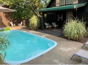 Hilltop Hideaway with a pool & tree house view! - Image 4