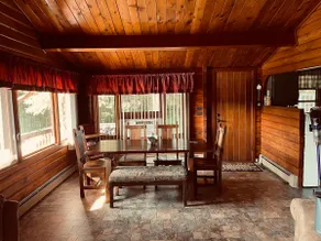 Cozy two bedroom log cabin on a peaceful lake - Image 2