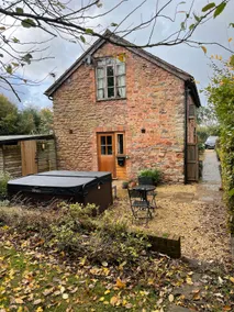 stylish barn conversion with hot tub and lake view - Image 4