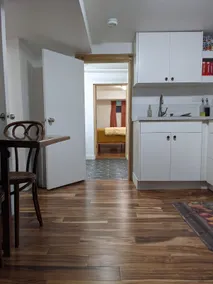 Lovely basement apartment with covered outdoor patio. - Image 3
