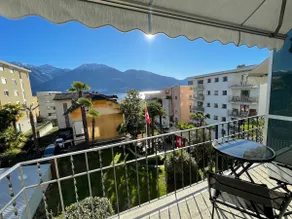 Lake and mountains directly from the bed in Minusio - 10 min. SBB - Image 2