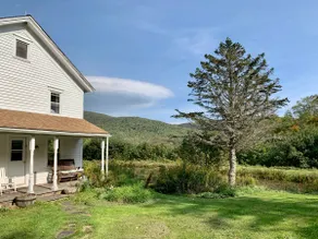 Mountain Farmhouse on 200 Acres with Pond - Image 4