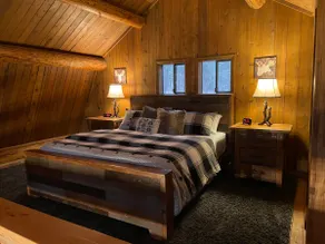 Rustic log cabin nestled in the woods - Image 3