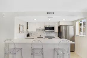 Luxurious condo steps to beach with heated pool! - Image 5