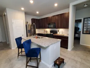 Modern 3-bedroom home with parking on premises. - Image 2