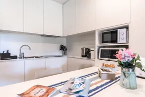 Trendy and Cozy apartment with Private Garden - Image 5