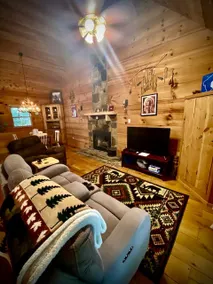 Cozy two bedroom cabin with a hot tub. - Image 2