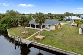Stylish Waterfront Retreat w/Tropical Views - Image 2
