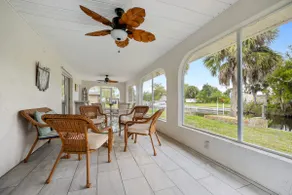Stylish Waterfront Retreat w/Tropical Views - Image 3