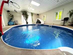 Cheerful 5 bedroom home | Heated Indoor Pool! - Image 4