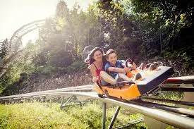 Mountain family hiking sledding zipline - Image 2