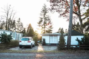 Expanded mobile home in wooded area - Image 2