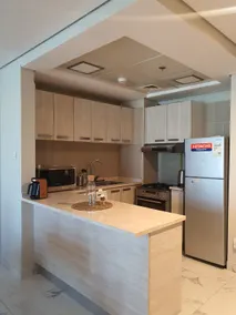 Cozy 1-bedroom apartment in Dubai South with Pool - Image 4