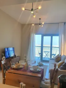 Cozy 1-bedroom apartment in Dubai South with Pool - Image 2