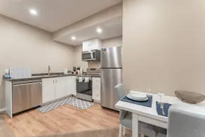 Beautiful Basement Suite | Washer+Dryer | Kitchen - Image 3