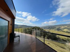 Luxury cabin with hot tub and lake views. - Image 4