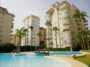 A bright apartment with a swimming pool and tennis - Image 2