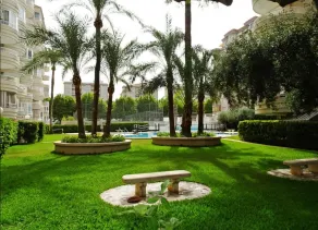 A bright apartment with a swimming pool and tennis - Image 4