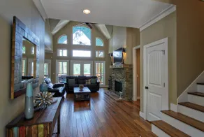 Lake home with wrap around porch and dock. - Image 3