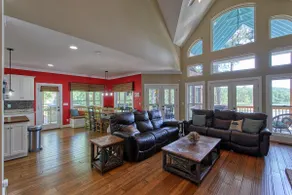 Lake home with wrap around porch and dock. - Image 4