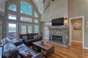 Lake home with wrap around porch and dock. - Image 5