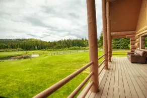 The Cabin · Rustic Log Cabin with Pasture and Mountain Views - Image 4
