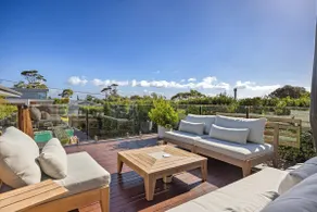 A stroll to the beach or enjoy the heated pool. - Image 2