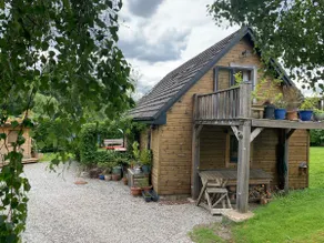 Wooden Lodge with wood burning stove and fire pit. - Image 2