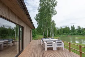 Modern holiday house on the shore of a waterhole with a sauna - Image 2