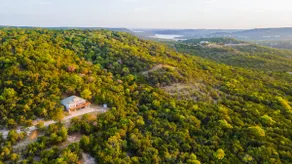 Hillside Glass House Nestled in Bird Sanctuary - Image 3