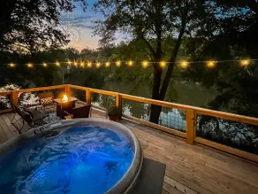 Relax in the hot tub with a view of the River! - Image 5