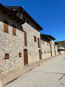 House surrounded by mountain and nature - Image 3