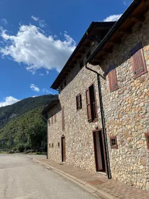 House surrounded by mountain and nature - Image 2