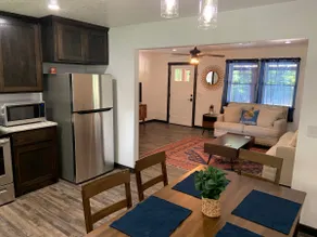 Cheerful 2 bedroom home with covered parking. - Image 2