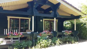Cozy Wooden House with a Porch on the Water! - Image 2