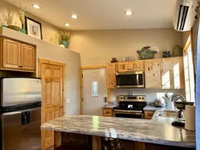 Sunny Apartment Getaway with Garage - Image 3