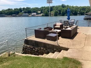 Lake front with view, dock and calm water - Image 2