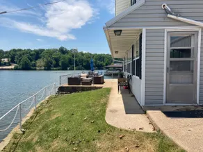Lake front with view, dock and calm water - Image 5