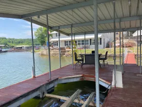 Lake front with view, dock and calm water - Image 4