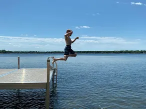Private Sandy Beach on White Sand Lake | Sleeps 14 - Image 2