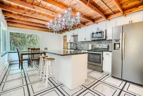 Quiet Creekside Retreat | Mid-Century | Central - Image 3
