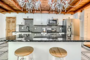 Quiet Creekside Retreat | Mid-Century | Central - Image 5