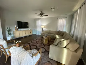 Spacious Surprise Home with Outdoor Pool and Game Room - Image 3