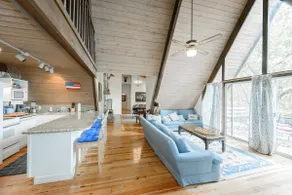 Double A-Frame lakefront home with dock and space. - Image 2