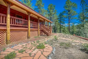 4-bedroom nestled in the trees with views! - Image 3