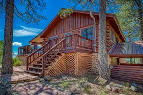 4-bedroom nestled in the trees with views! - Image 2