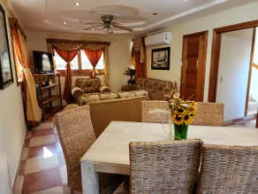 Cheerful 2-bedroom villa with shared pool - Image 2