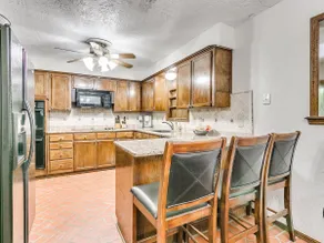 The Magnolia - A Lush and Inviting Home in Norman - Image 2