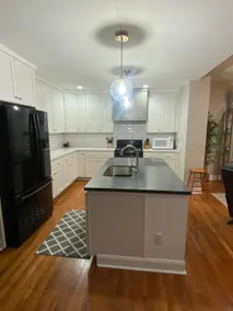 * Nicely renovated spacious home with large deck. - Image 3