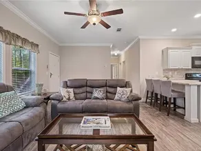 Waterfront home with dock and boat ramp - Image 3